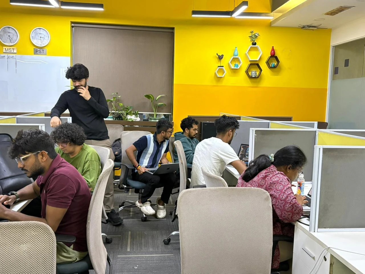 The Persistence team working in the office